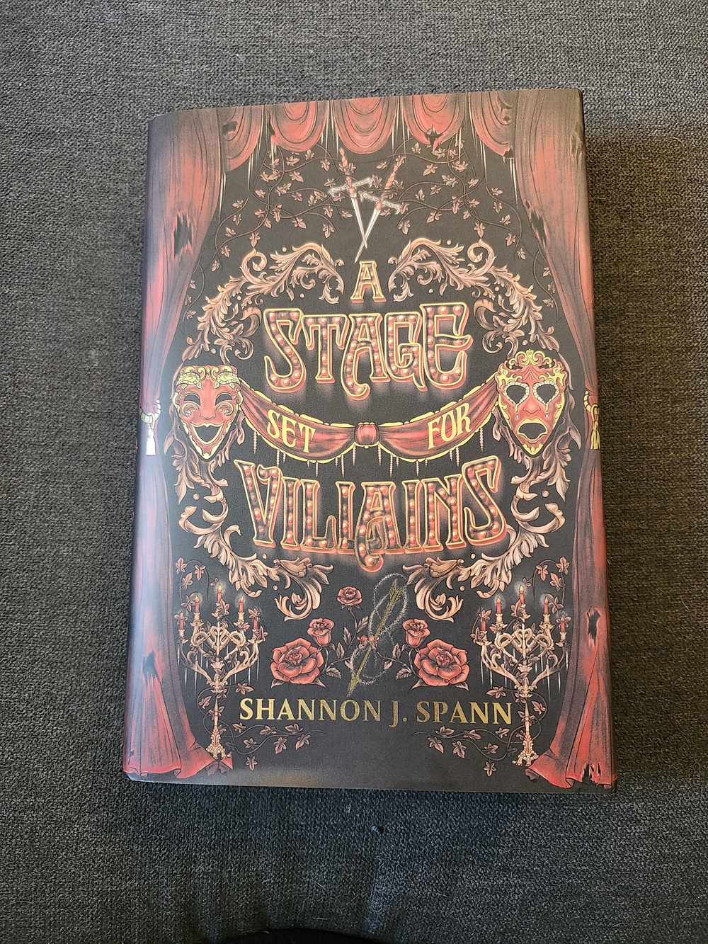 A Stage Set for Villains by Shannon J. Spann — Black and Red Hardcover Book